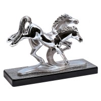 Statua in resina argentata "cavalli imbizzarriti"